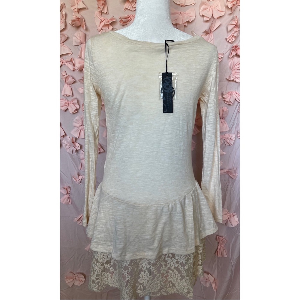 Cream colored long top. Size M